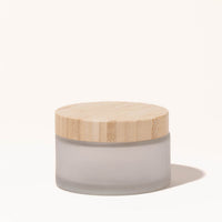 Simply Zero Forever Jar in frosted glass with bamboo lid, large 6.7 oz size, on a cream background
