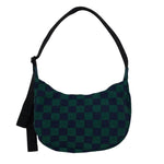 Green and black checkered bag with a strap on a white background