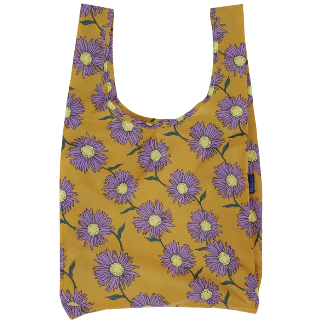 Reusable bag with purple floral pattern on mustard yellow background