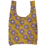 Reusable bag with purple floral pattern on mustard yellow background