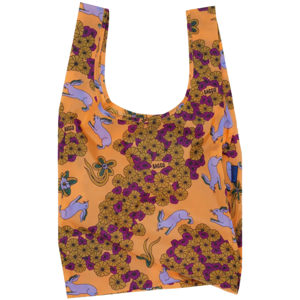 Reusable bag with floral and rabbit pattern on a white background