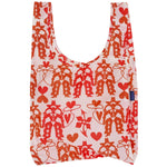 Reusable bag with red cowgirl pattern on a white background